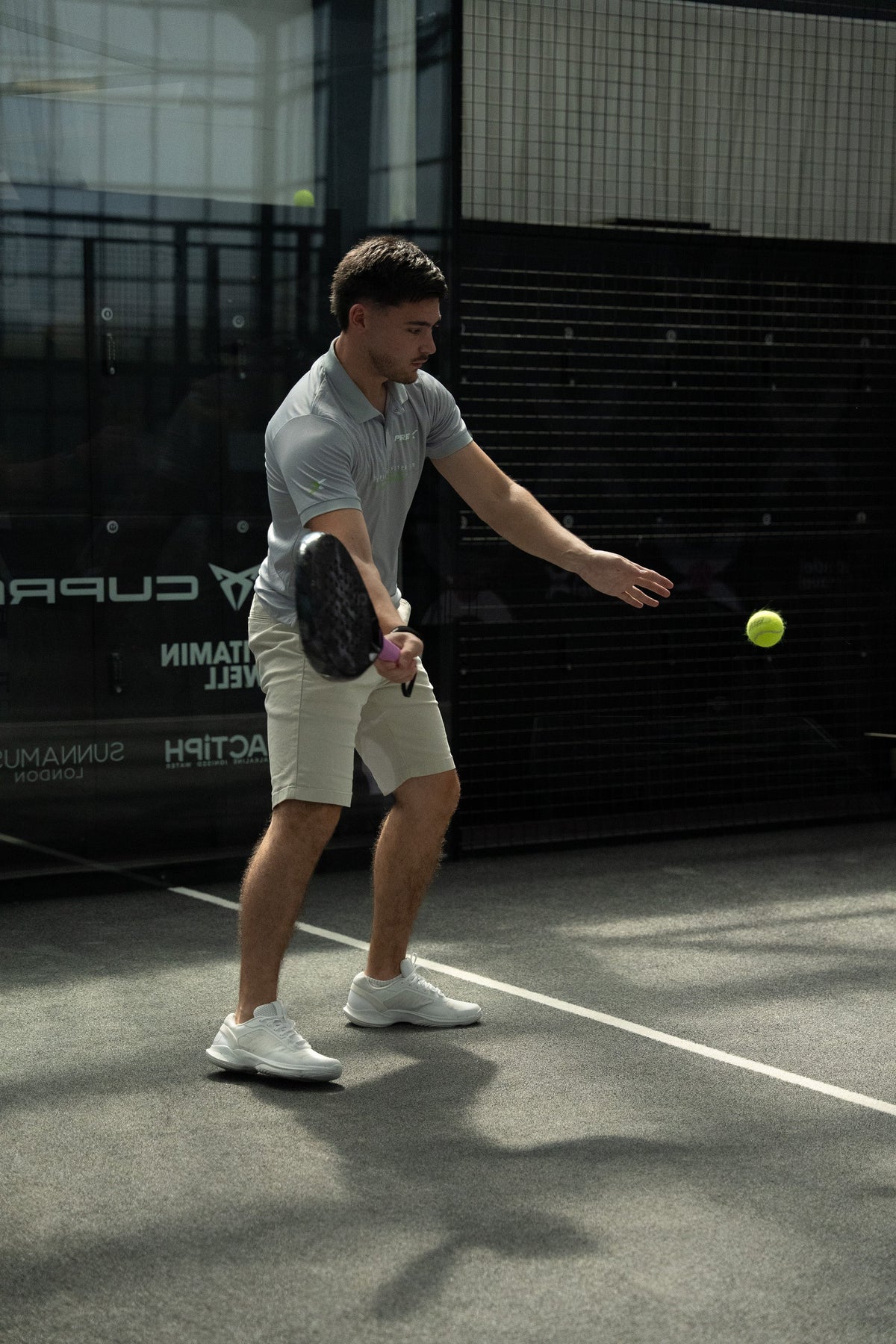 12k Padel Midnight Black racket on court, photographed during the Find Padel UK review