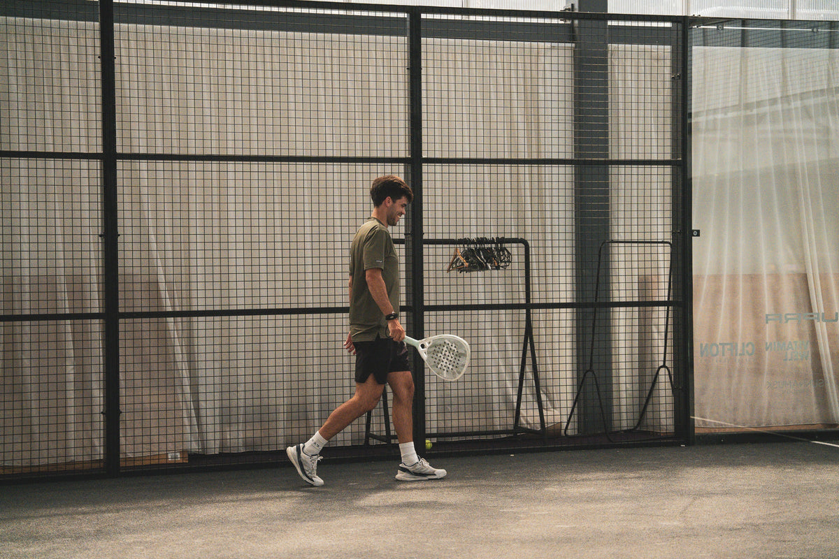 12k Padel Midnight Black racket on court, photographed during the Find Padel UK review