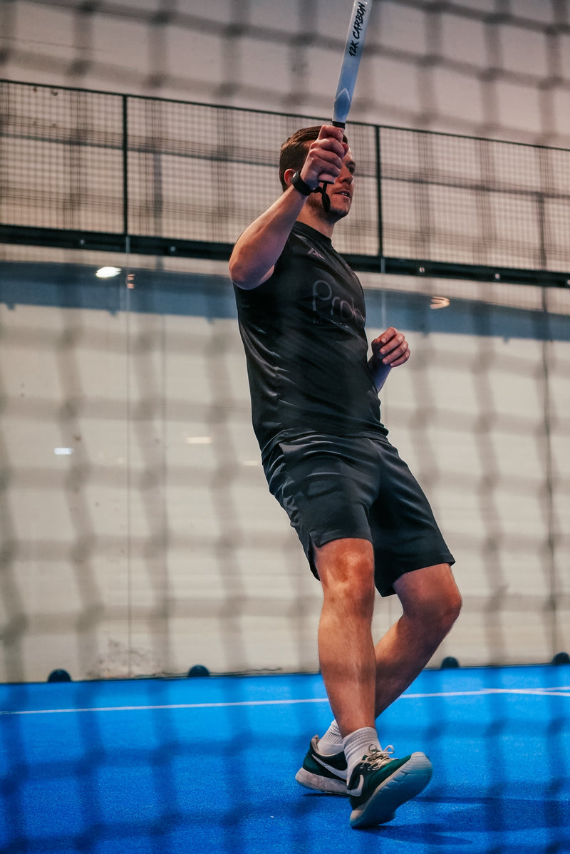 12K Padel racket on a blue padel court
