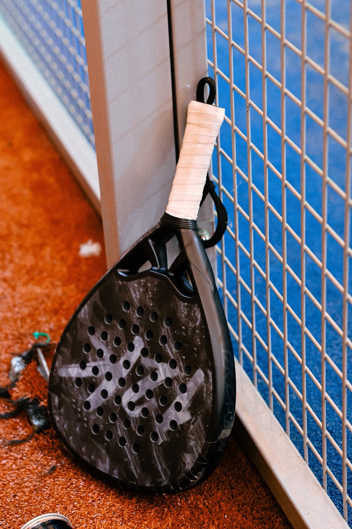 12k Padel racket on court, photographed during the Find Padel UK review