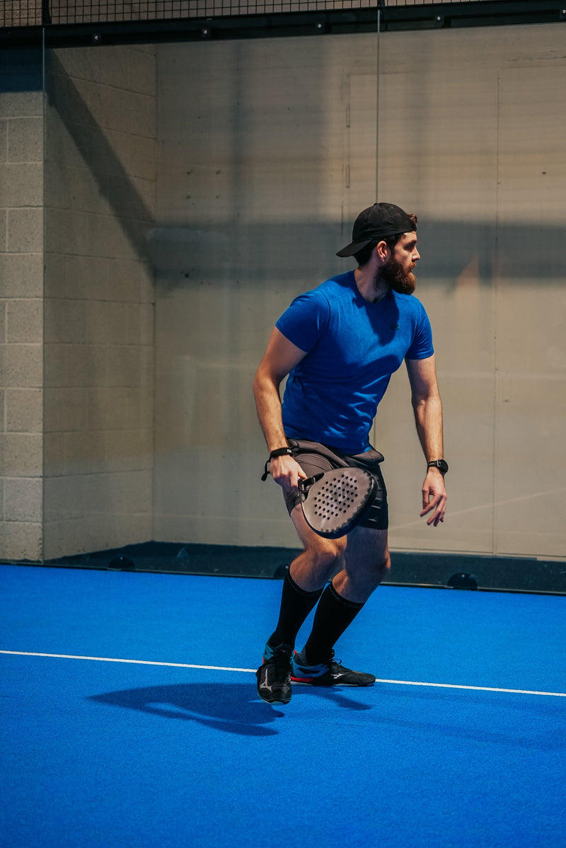 12K Padel racket on a blue padel court