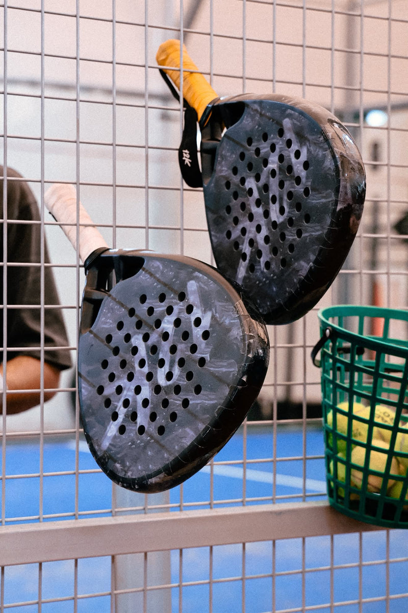 12k Padel racket on court, photographed during the Find Padel UK review