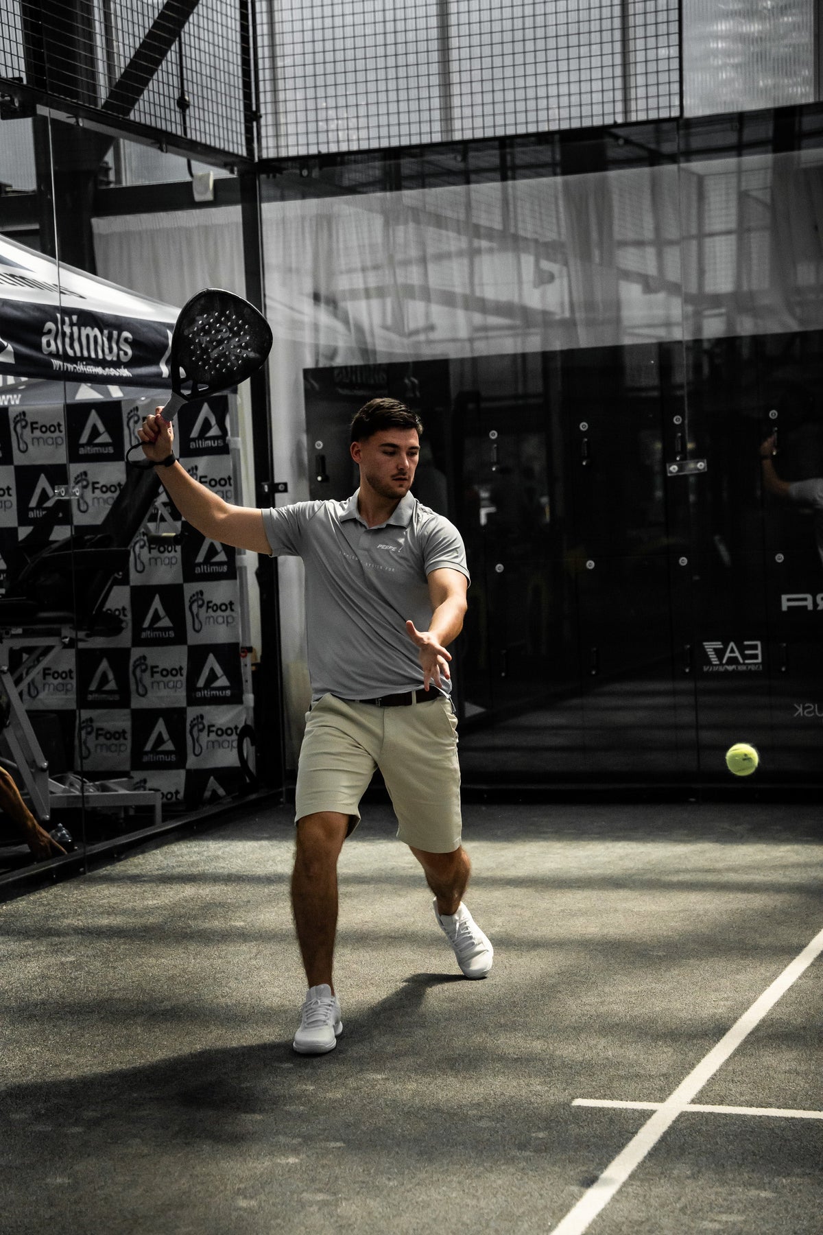 12k Padel Midnight Black racket on court, photographed during the Find Padel UK review