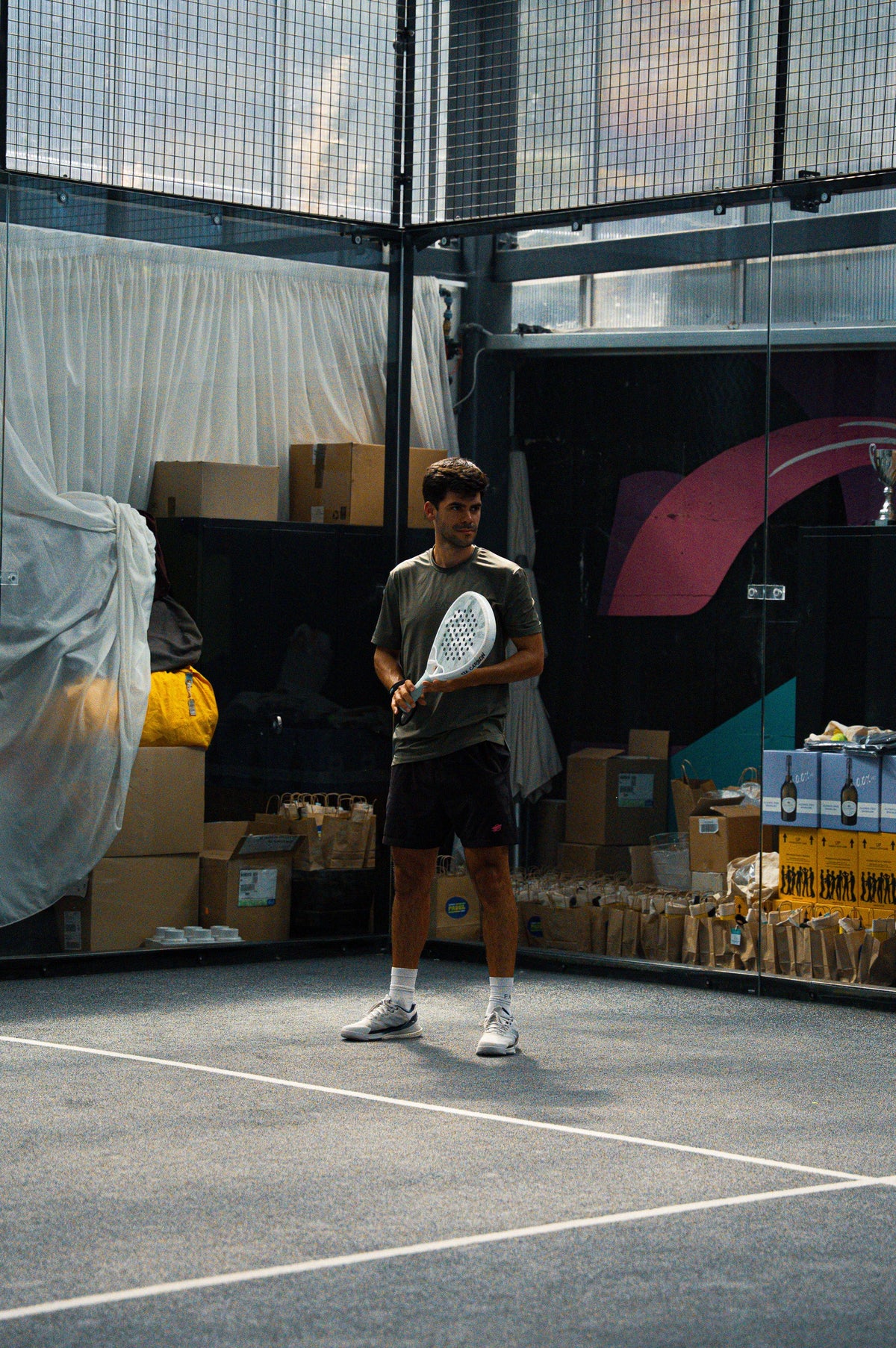 12k Padel Midnight Black racket on court, photographed during the Find Padel UK review