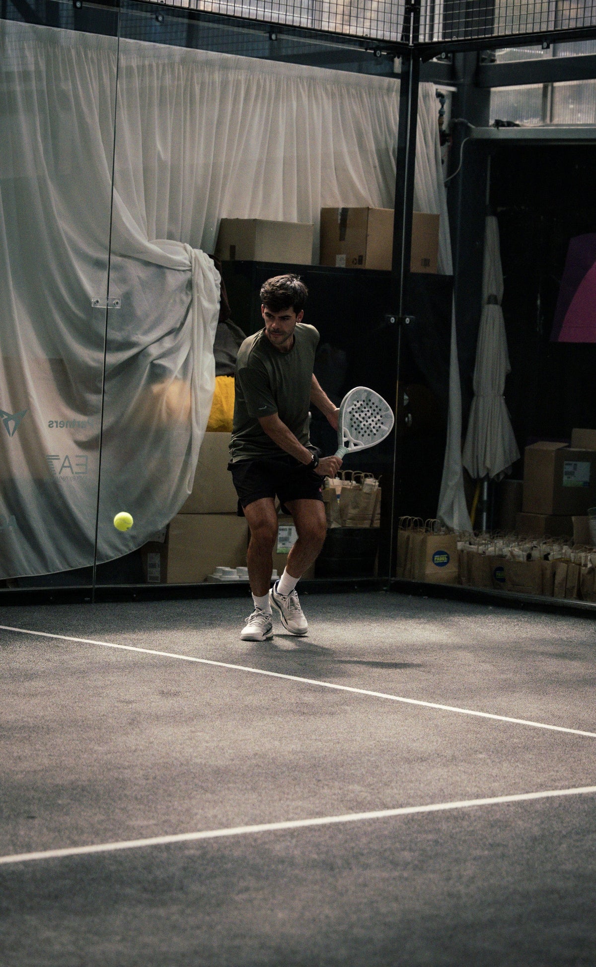 12k Padel Midnight Black racket on court, photographed during the Find Padel UK review