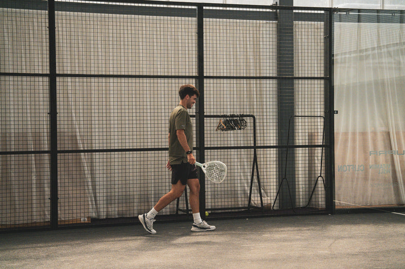 12k Padel Midnight Black racket on court, photographed during the Find Padel UK review