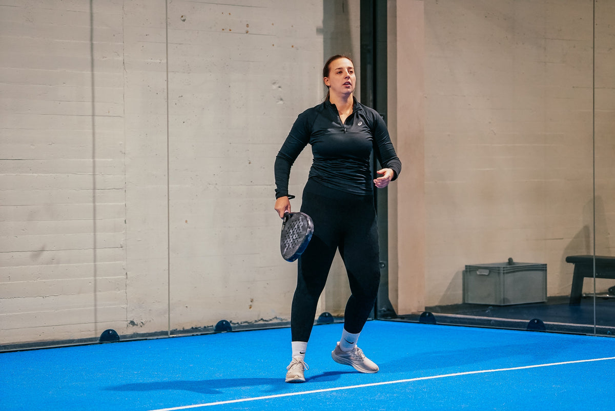 12K Padel racket on a blue padel court
