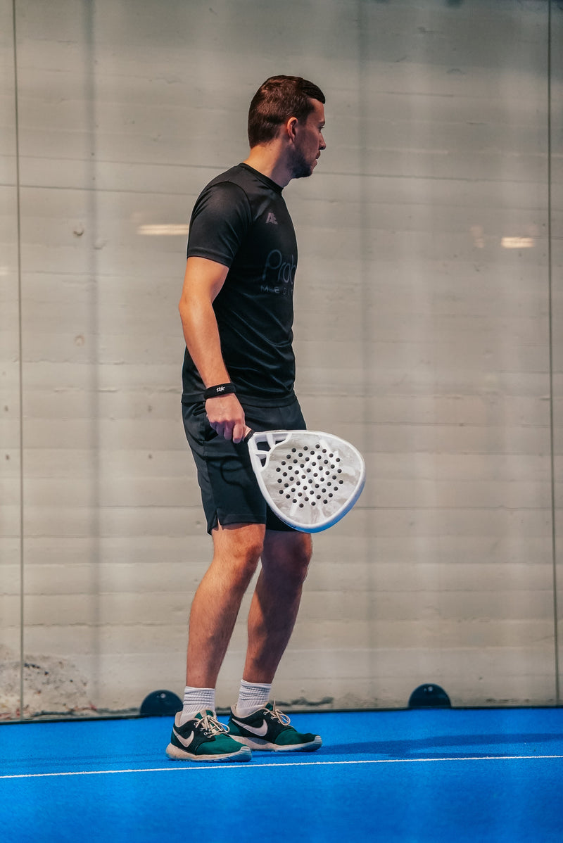 12K Padel racket on a blue padel court