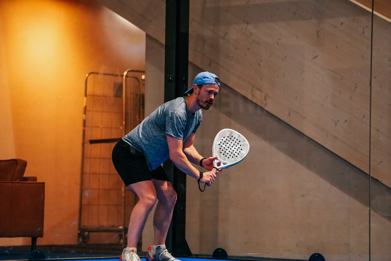 12K Padel racket on a blue padel court