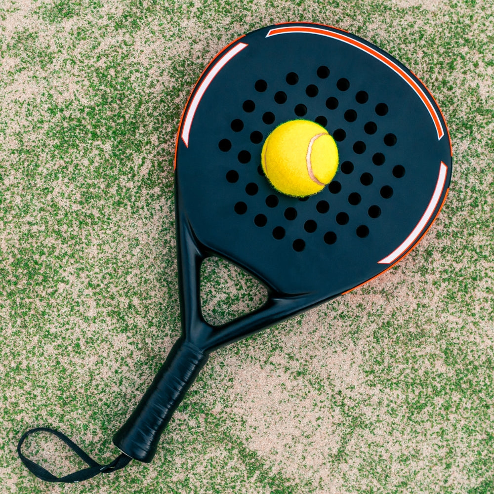 A couple playing padel together on a UK court, reflecting the sport's fast-growing popularity